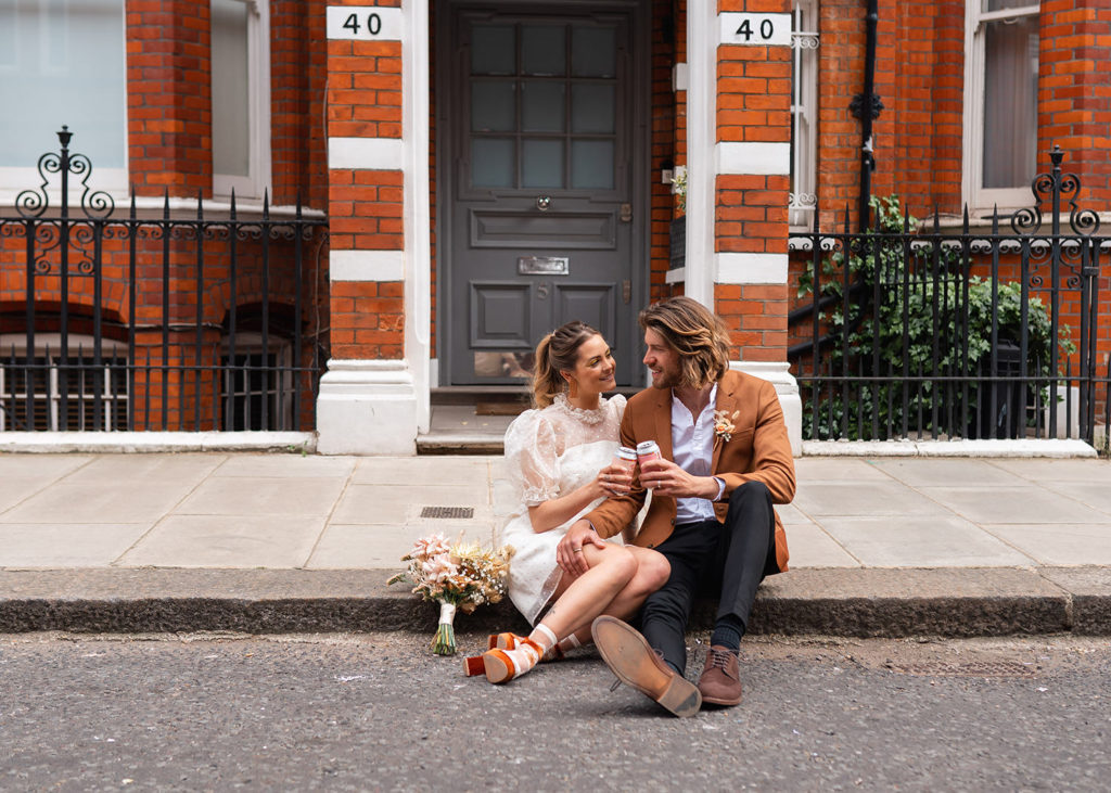 Newly weds cheers at London elopement
