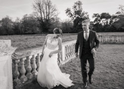 Black and White bride and groom walking together