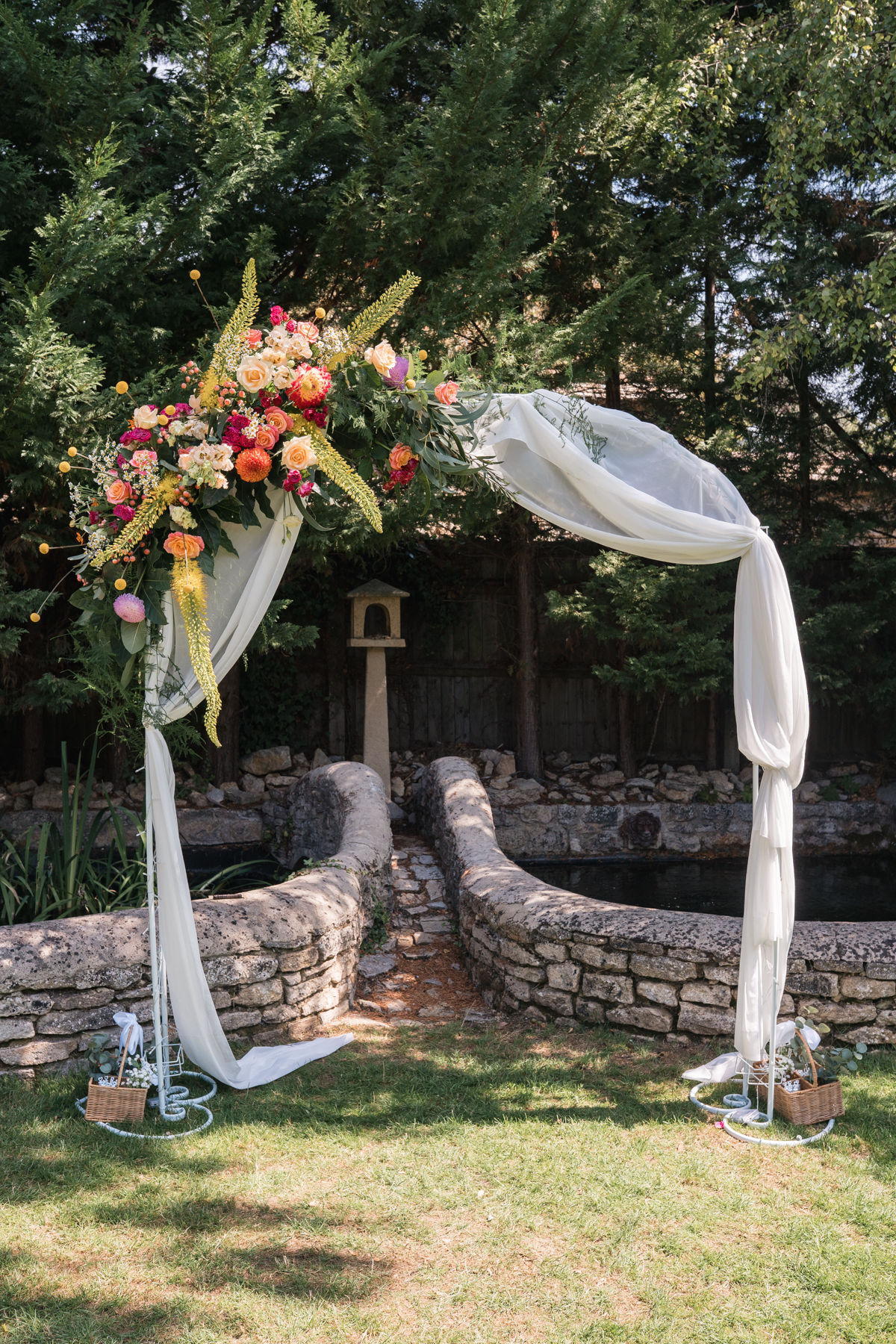 outdoor floral wedding arch