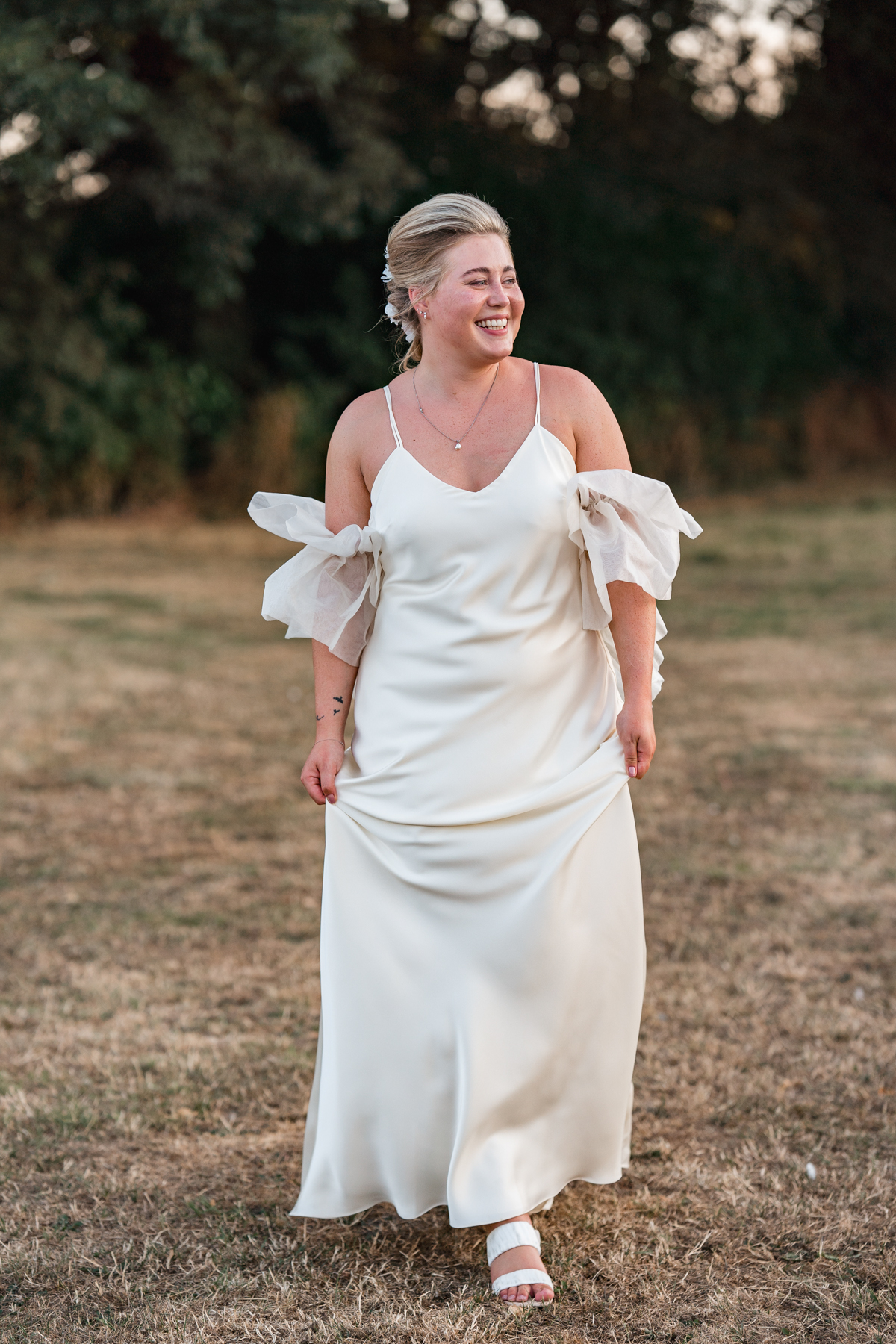 Bride in halfpenny london wedding dress
