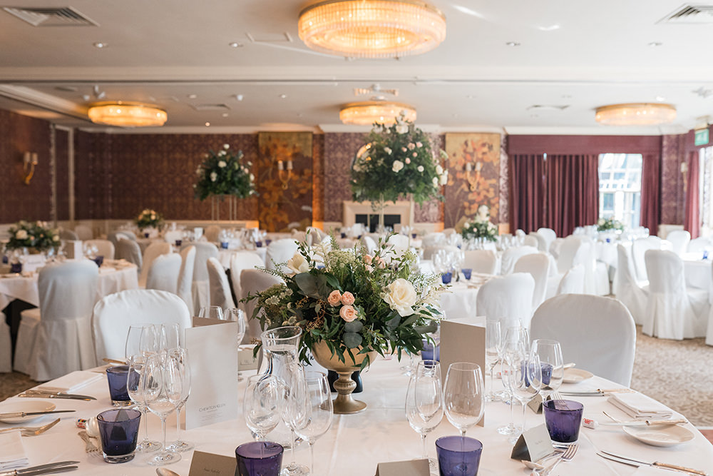 large floral display in reception room at chewton glen wedding