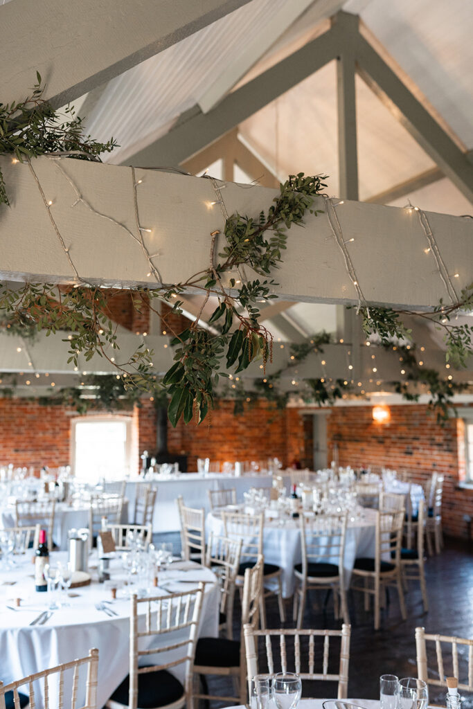 close up of vines wrapped around the vaulted ceiling at Sopley Mills reception room