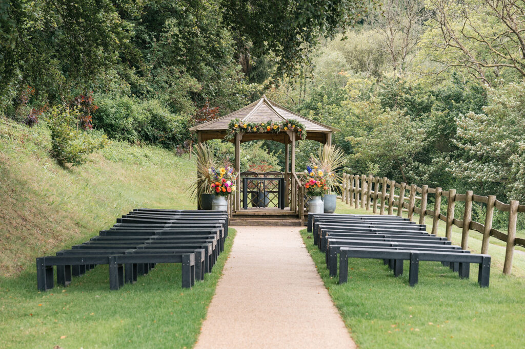 View of outdoor ceremony space at Gorwell Farm, Barn wedding venue