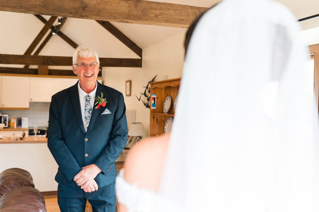 First look with father of the bride on wedding day, UK