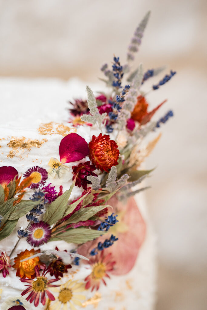 dried flower cake at rustic barn wedding, dorset