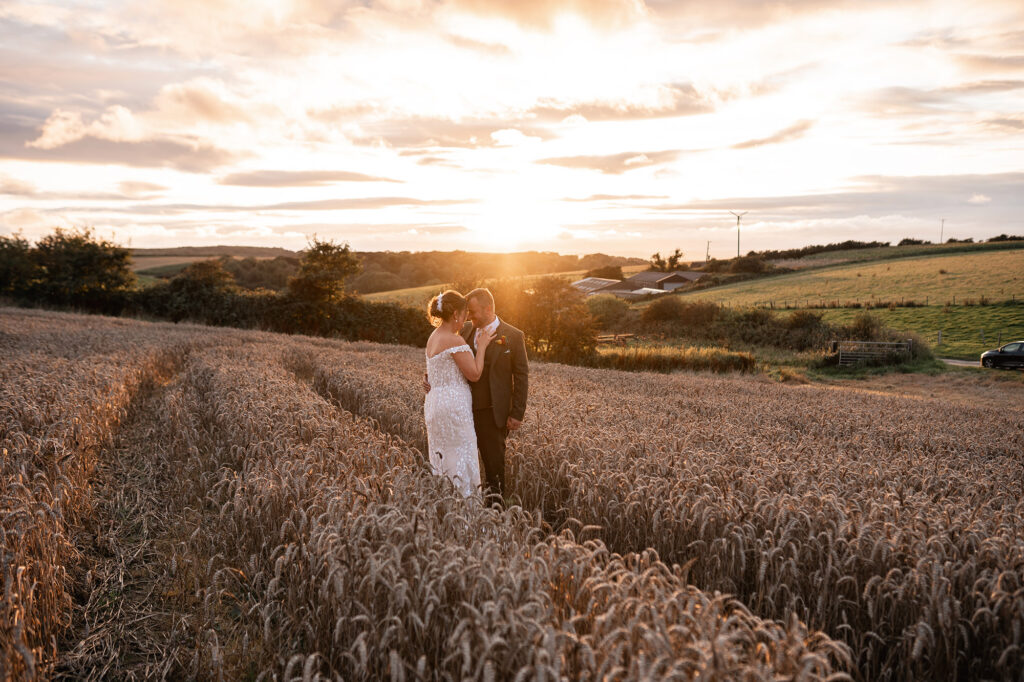 Bride and Groom at Golden Hour Sunset at Gorwell Farm, Barn Wedding, Dorset
