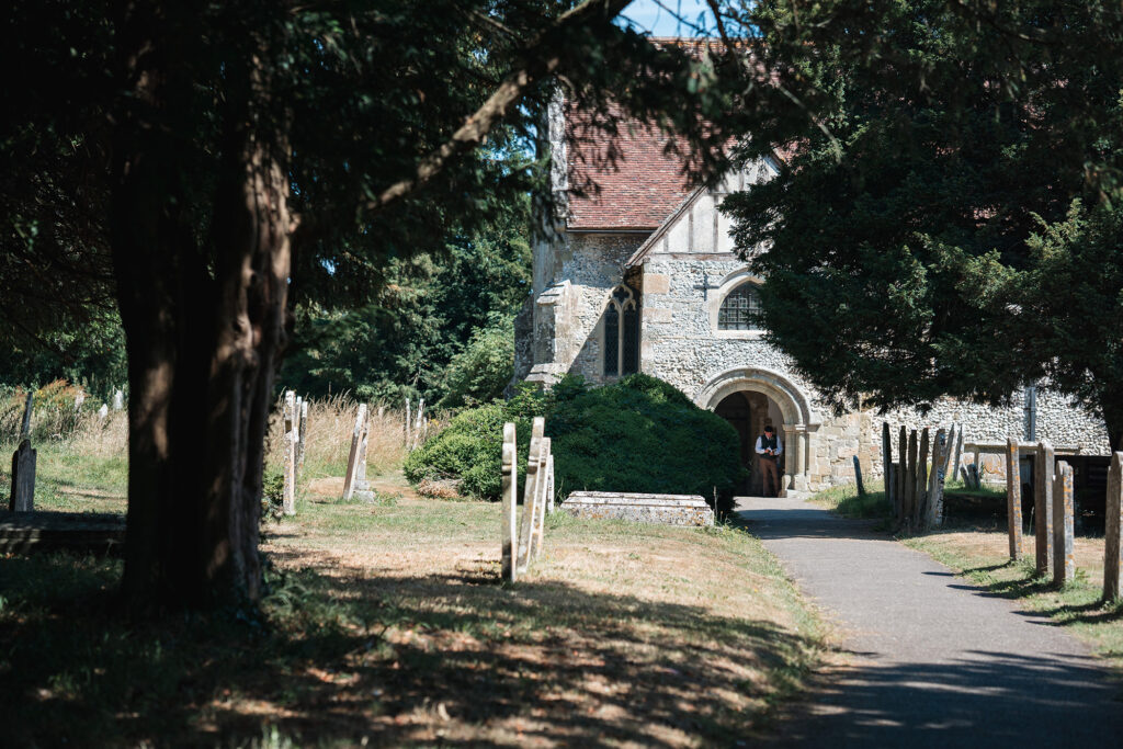 new forest church, surrounded by trees, before the brides arrival