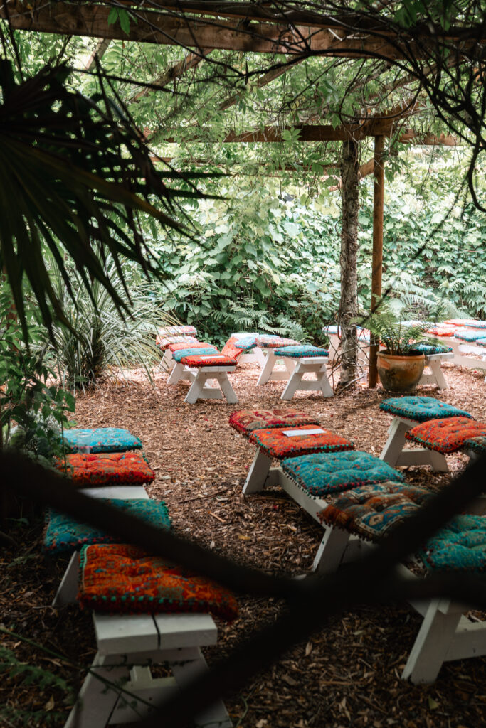 Harewood Forest ceremony seating area with coloured cushions 
